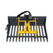 top-down frontal view of MechMaxx 20-inch mini skid steer rock grapple bucket showing black tines and yellow hydraulic grapple assembly gallery position 1
