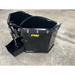 black skid steer attachment with Stinger branding, heavy metal construction, and hydraulic components on concrete surface