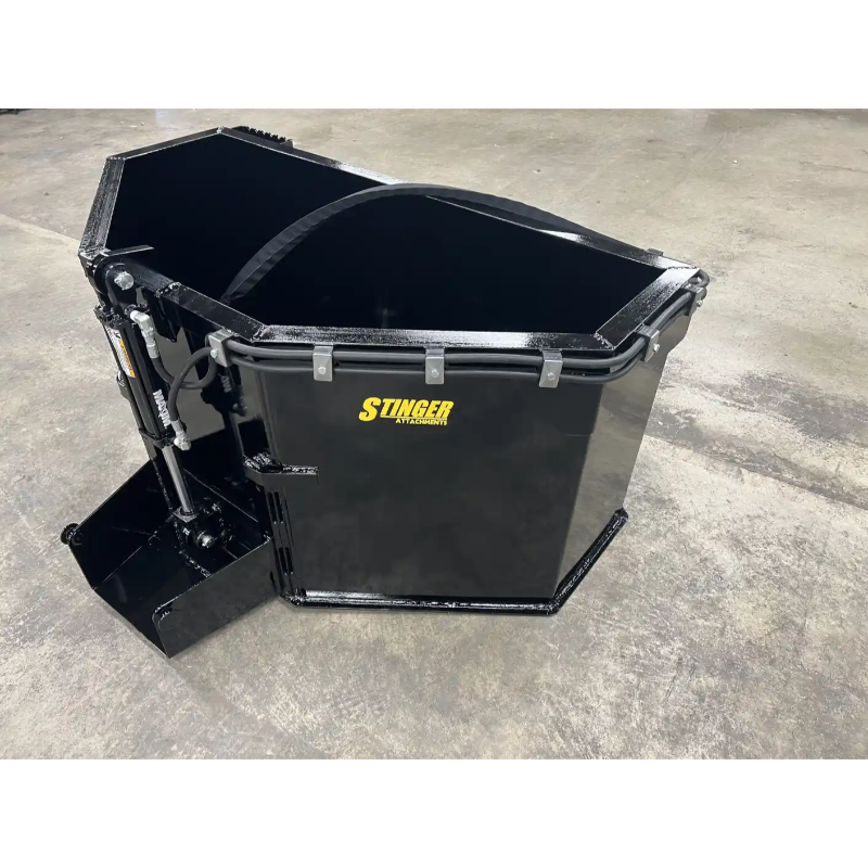 black skid steer attachment with Stinger branding, heavy metal construction, and hydraulic components on concrete surface