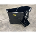 Black metal Stinger attachment with hydraulic components on concrete surface