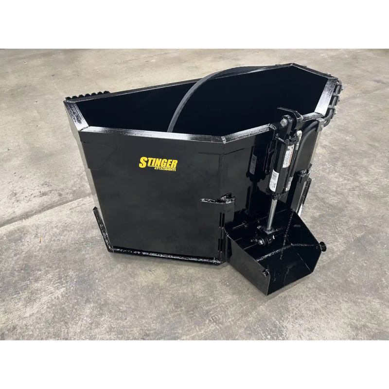 Black metal Stinger attachment with hydraulic components on concrete surface