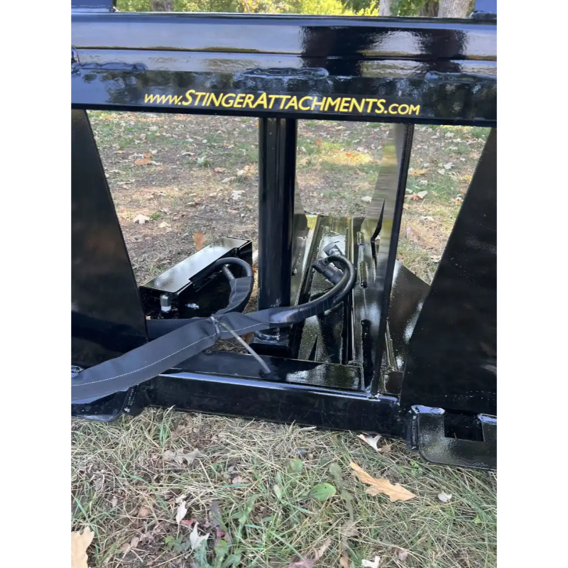 Stinger Attachments STP Tractor Tree Puller close-up showing hydraulic lines and frame, gallery position 7, 800x800 square image
