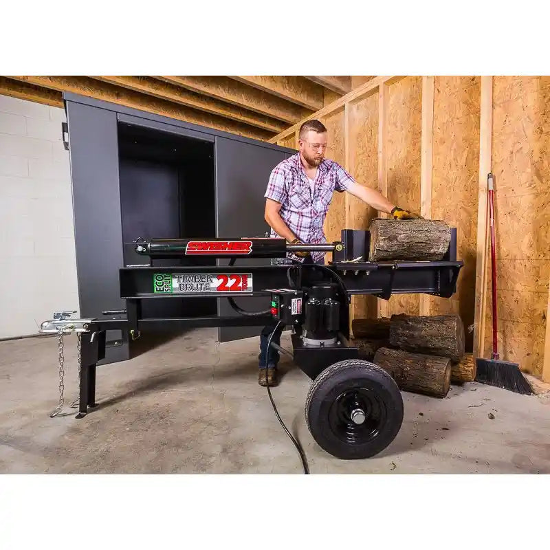 Operator loading large log onto Swisher 22-Ton Timber Brute Eco Split electric log splitter, gallery position 1