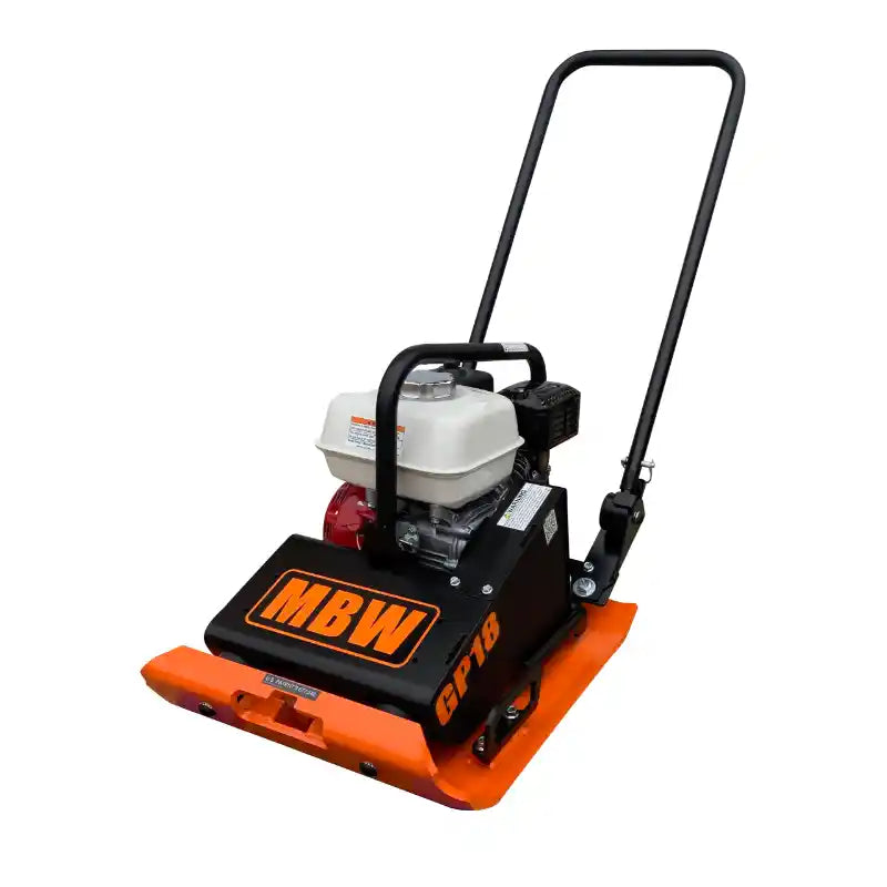 Compact orange and black vibratory plate compactor with white engine and upright black handle on white background